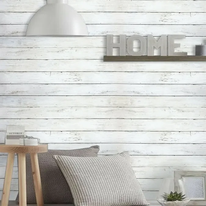 Can self-adhesive wood textured decorative wallpaper be reused after repositioning or is it a one time installation